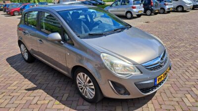 Opel-Corsa-2012-1.4 L-74 kW-101pk-219000km-Nav-Airco-5 deurs-Cruise Control - Image 7