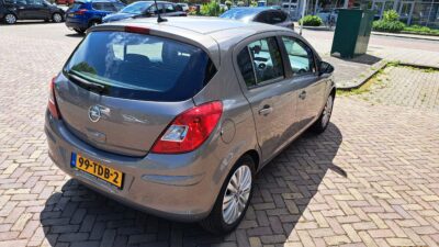 Opel-Corsa-2012-1.4 L-74 kW-101pk-219000km-Nav-Airco-5 deurs-Cruise Control - Image 6