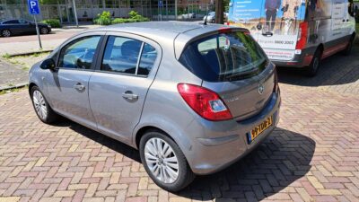 Opel-Corsa-2012-1.4 L-74 kW-101pk-219000km-Nav-Airco-5 deurs-Cruise Control - Image 5
